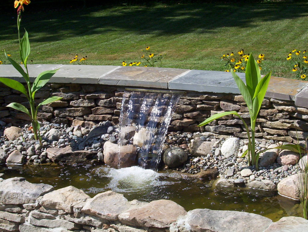 Stone Patio, Water Feature and Landscaping Project in Potomac, MD
